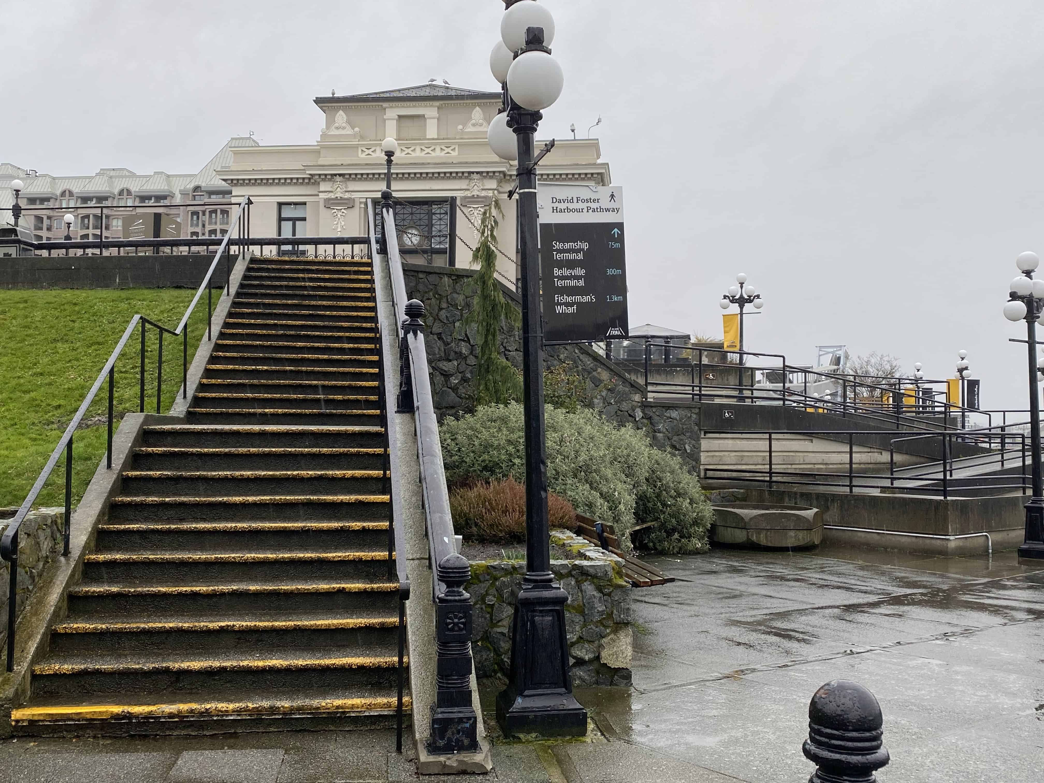 These stairs lead up to the street level.  Stay right to remain on David Foster Harbour Walkway.