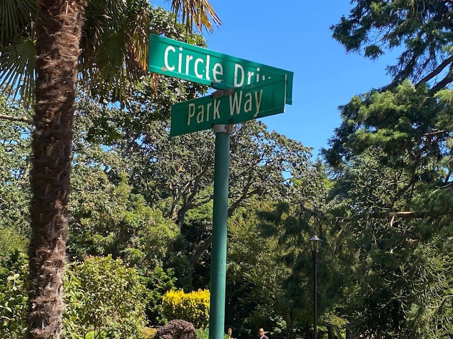 Signs showing where parking is off Circle Drive and Park Way, close to Children's Farm in Victoria BC's Beacon Hill Prk